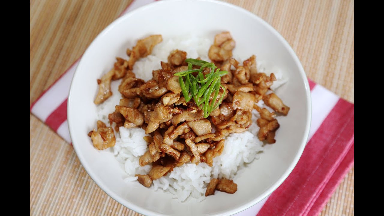 Rice topped with fried pork, garlic and pepper